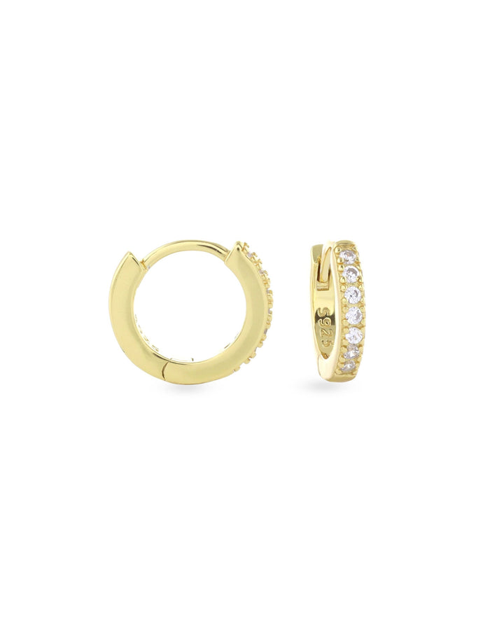 The Mini Clear Huggies, a pair of small gold hoop earrings with sparkling clear cubic zirconia stones.||| GOLD