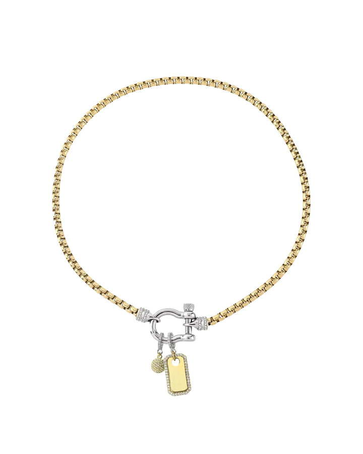 The Herradura Signature Charm Party, a mixed-metal necklace featuring a gold chain, silver-tone herradura clasp, and 2 charm accents. ||| SILVER