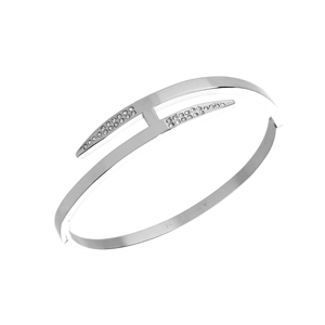 The ARROW SHINI, a stylish silver bracelet featuring a sleek, angular design with sparkling crystal accents. 