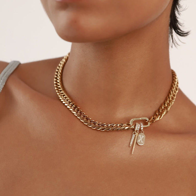 Model wearing the Just Click Letter Chain made of 18k gold plated 9mm chain with the LETTER JUST CLICK CHARM made of gold filled encrusted zirconia initial.