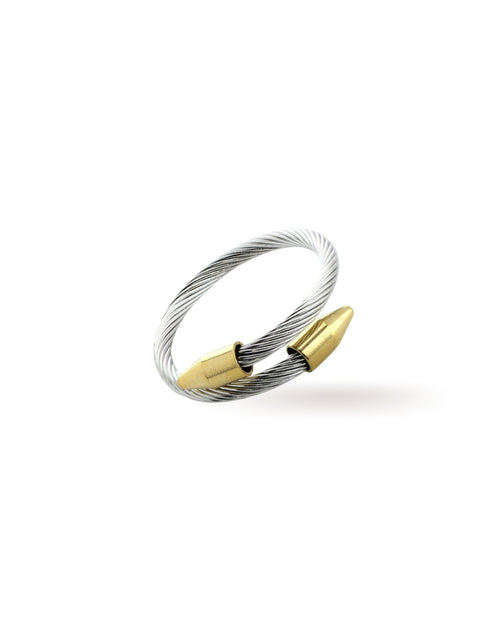 The Clavo Wire Ring, which is a unique silver coiled wire ring featuring two gold-toned nail-shaped accents. ||| MIX