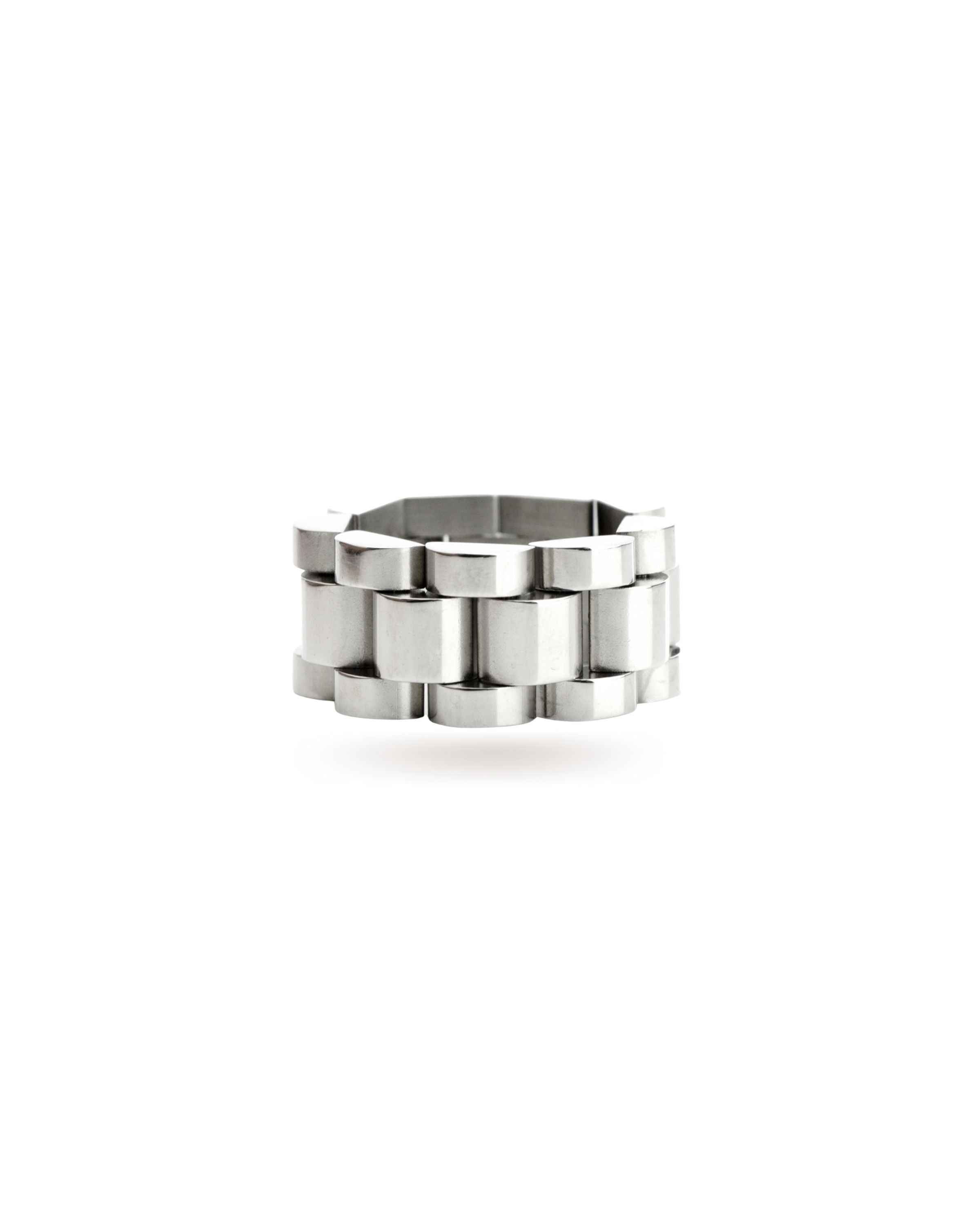 The Move Ring, a silver ring with a unique design resembling interlocking silver links. ||| SILVER