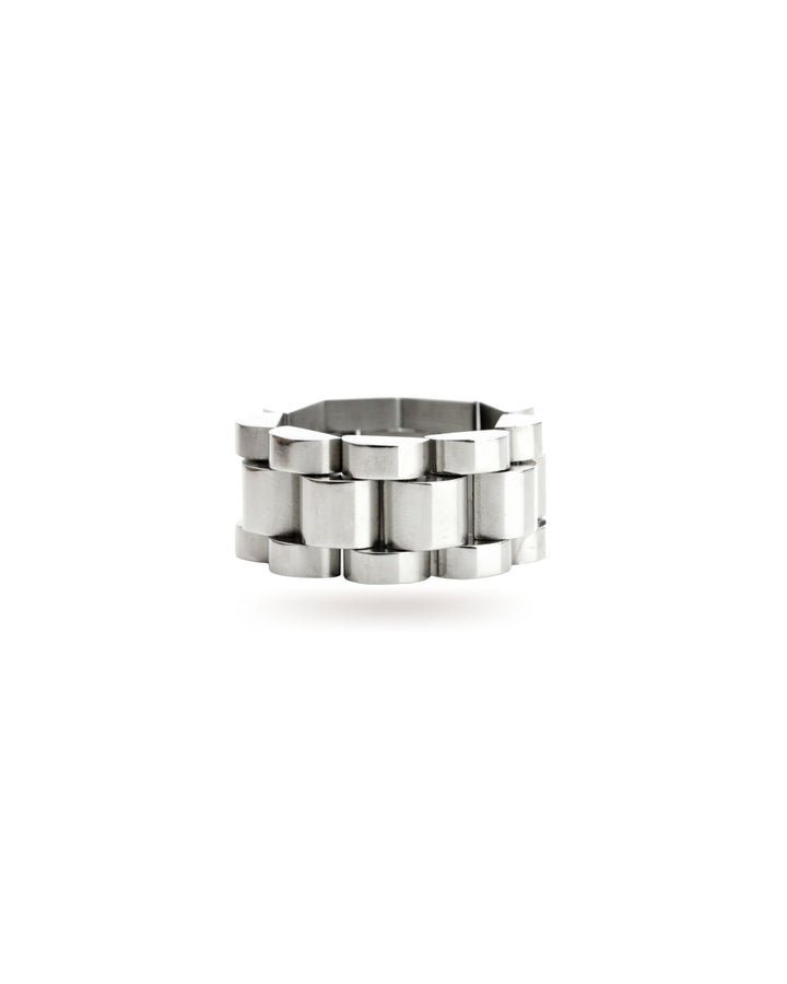 The Move Ring, a silver ring with a unique design resembling interlocking silver links. ||| SILVER