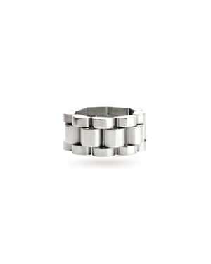 The Move Ring, a silver ring with a unique design resembling interlocking silver links. ||| SILVER