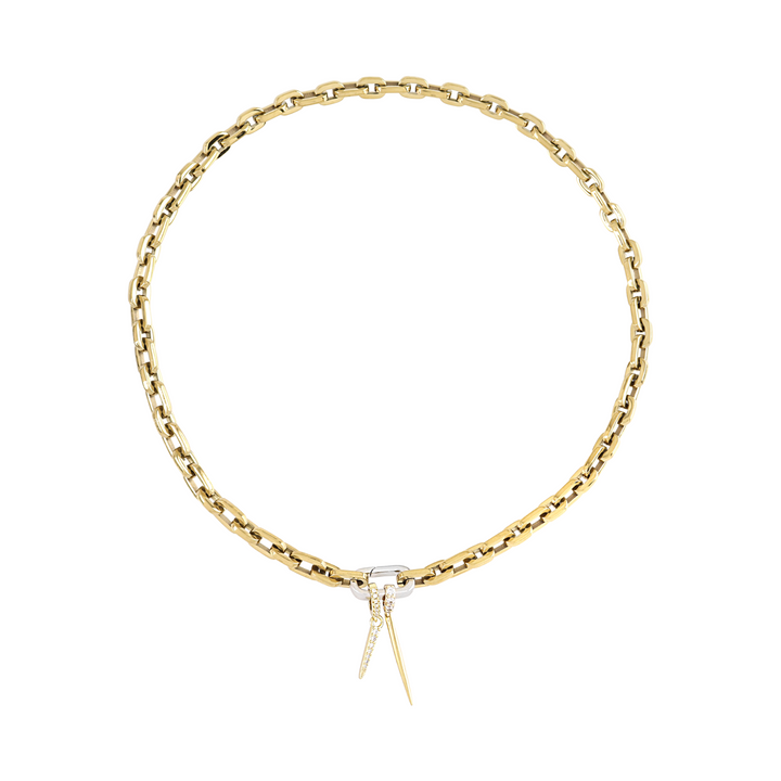The Just Click Needle Puerto, a gold chain with a lobster clasp closure and two charms: a diamond-like encrusted spike and a smaller spike.