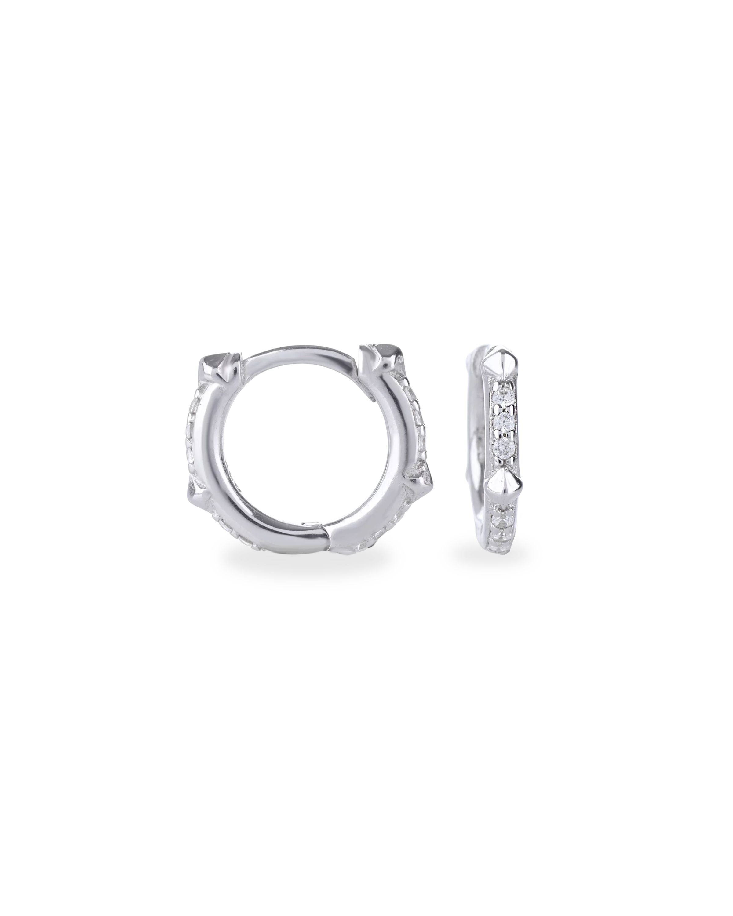 The Touch Spike Hoop, a silver hoop earring with a unique spike design and accents of sparkling cubic zirconia stones.