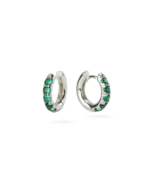 The Eternity Emerald Hoops, a pair of silver hoops featuring emerald accents.