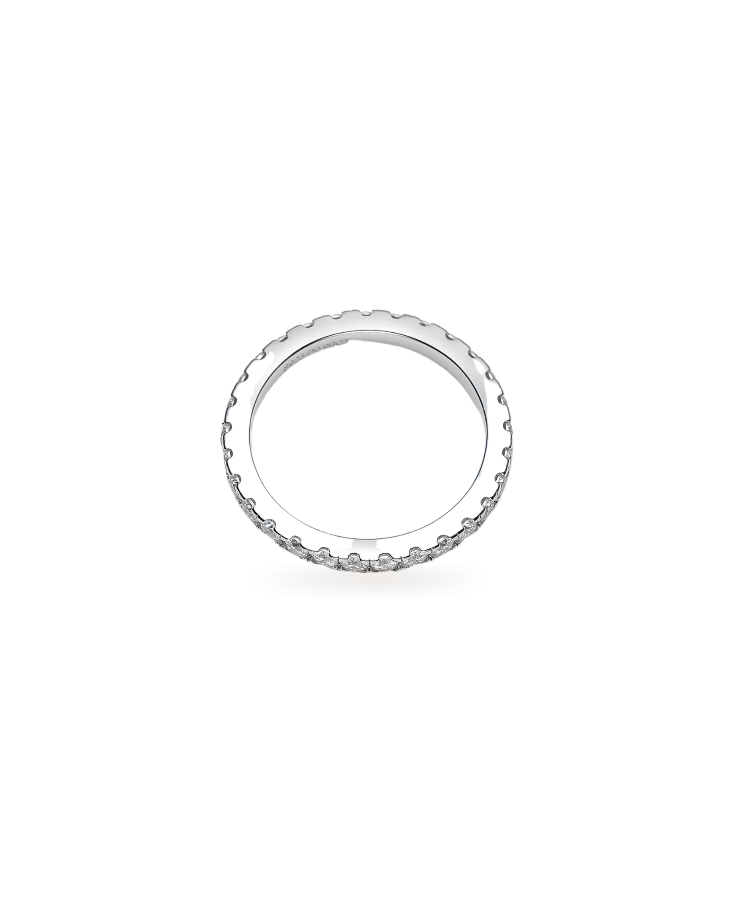 The Full Eternity Band Ring, a silver ring featuring a continuous line of sparkling diamond-like stones.