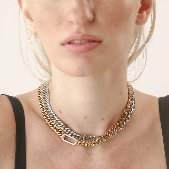 Model wearing the Just Click Gold Chain, a single gold chain with a lobster clasp closure also the just click chain in silver. ||| GOLD