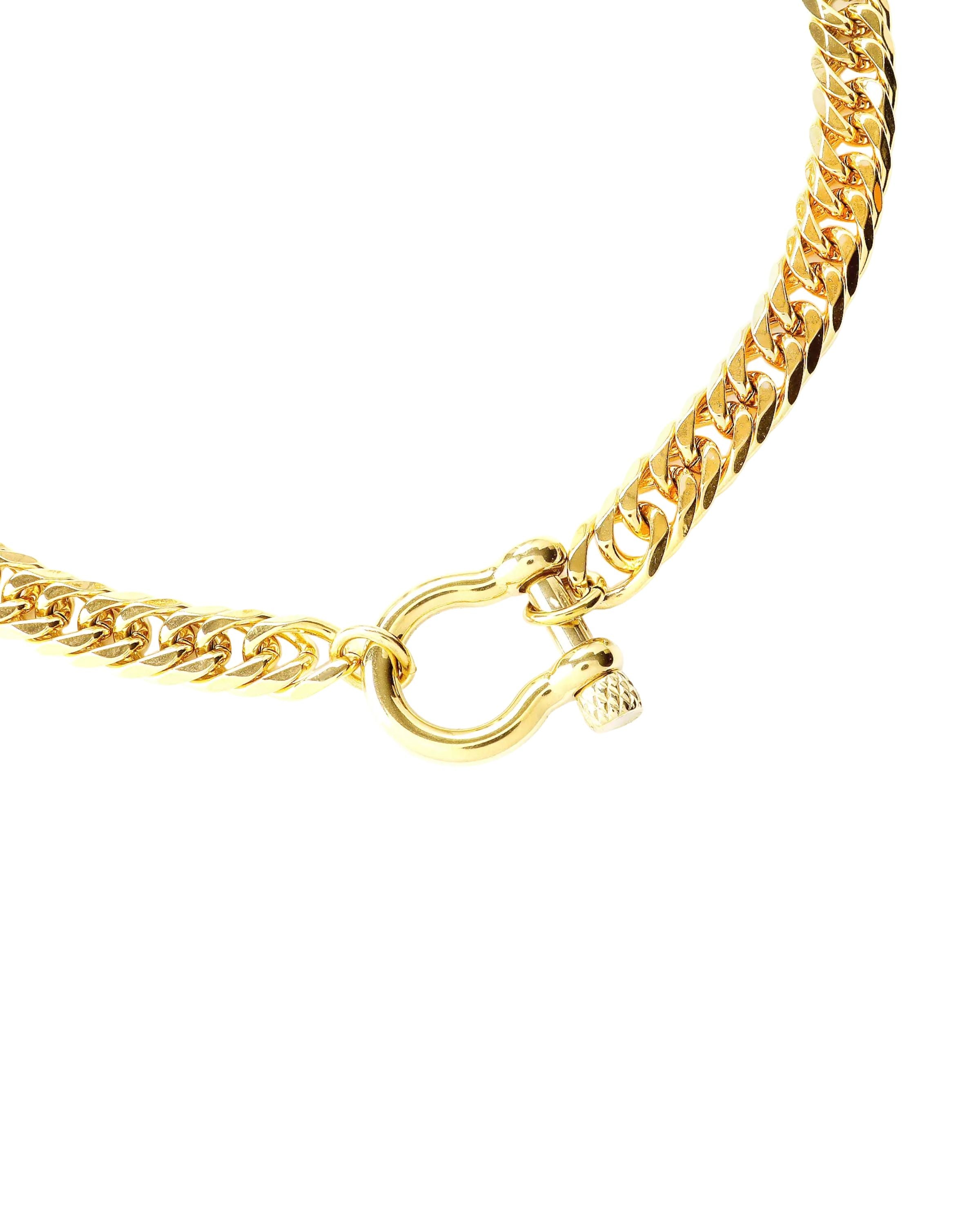 The Herradura Tropicana, a bold gold-tone necklace with a sleek chain design and signature Herradura clasp, perfect for any statement look. ||| GOLD