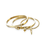 The ARROWHEAD BRACELET STACK, a stylish gold bangle set featuring 3 bracelets with intricate arrowhead details and sparkling diamonds. Includes a chain bracelet with arrowhead and triangle charms. 