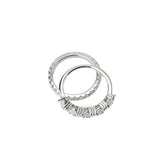 The Eternity Ring Set, a two-piece silver ring set featuring two bands of sparkling diamond-like stones in various shapes.