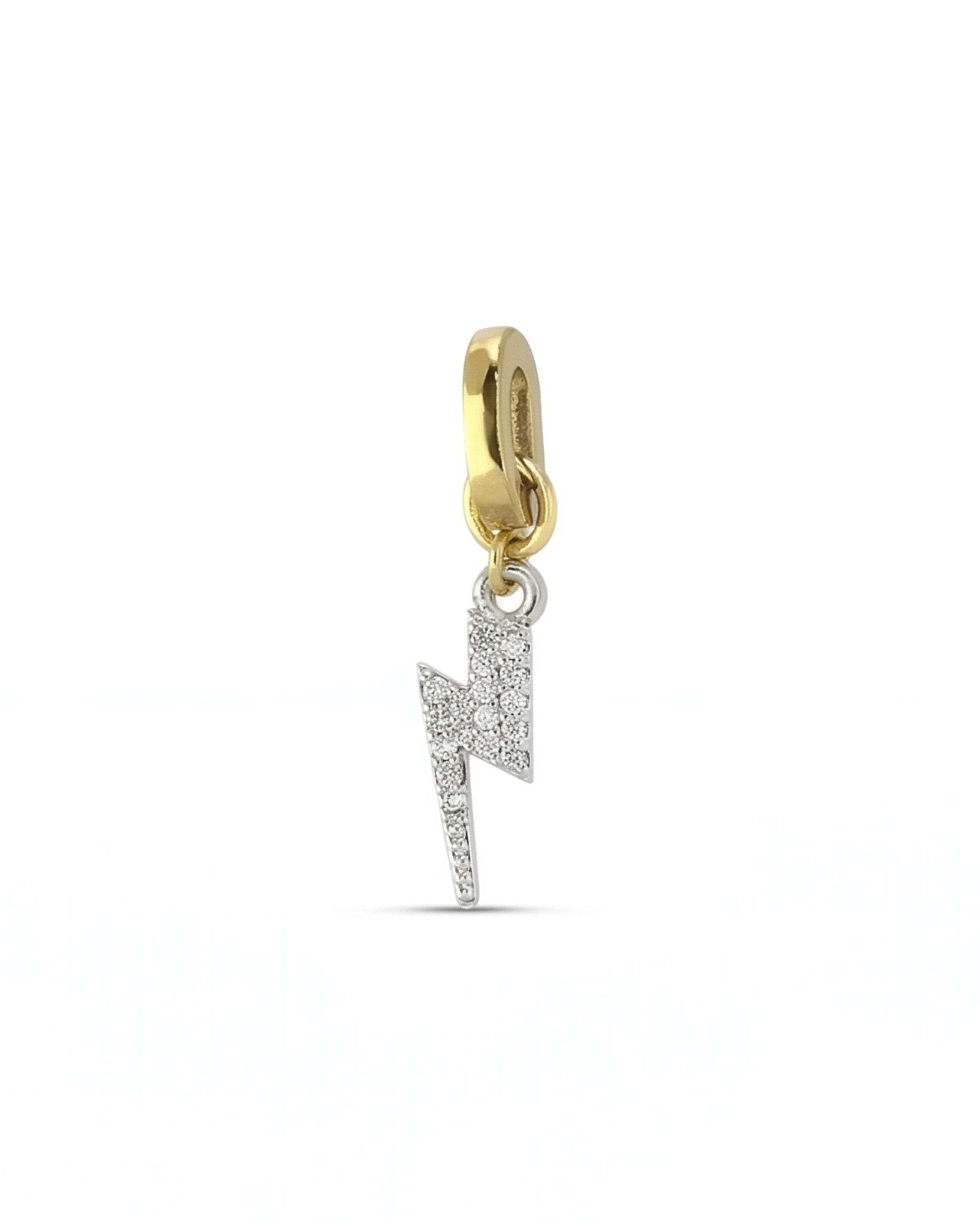 The Lighting Bolt Link Charm, a gold lightning bolt charm with pave-set diamond-like stones.