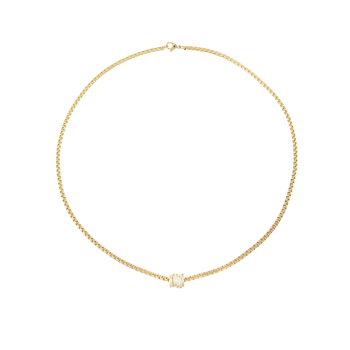 The Nut Necklace, a gold box chain with a gold nut-shaped pendant encrusted with stones. ||| GOLD