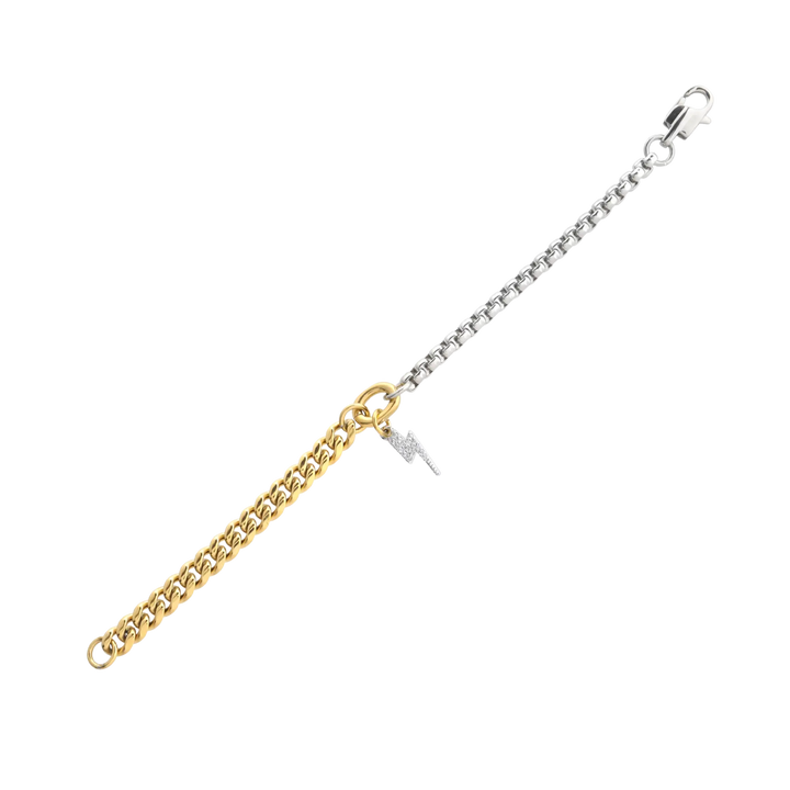 The OPPOSITES ATTRACT CHAIN BRACELET, a two-tone bracelet with half gold Cuban links and half silver box chain, featuring a small Lightning charm hanging from the center. ||| Lightning Charm/MIX