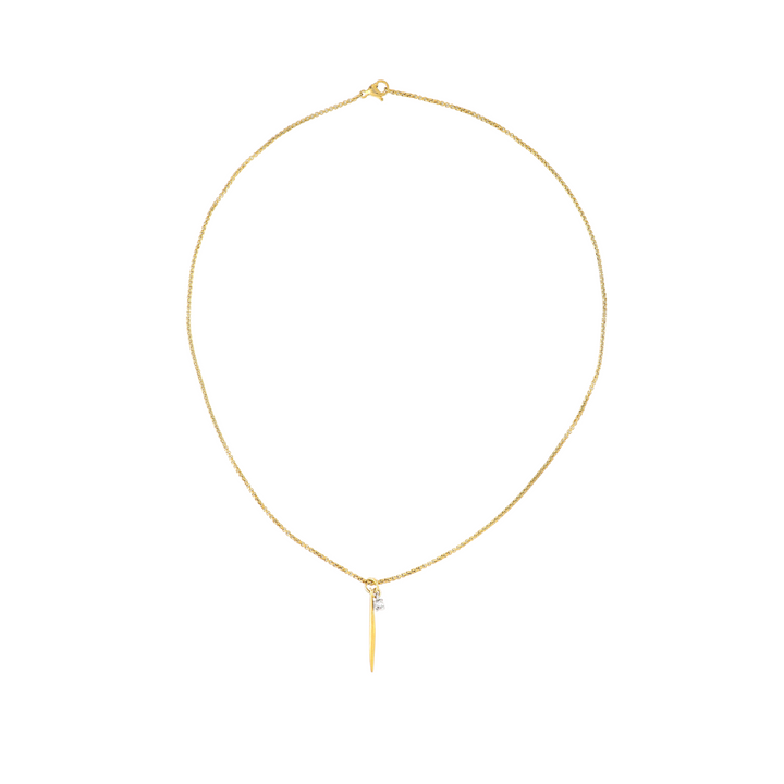The Needle Solitaire Necklace, which is a single-layer gold necklace, features a sleek needle-shaped pendant accented with a tiny sparkling solitaire crystal. This minimalist yet elegant piece is perfect for everyday wear or layering with other gold necklaces for a chic, modern look