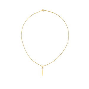 The Needle Solitaire Necklace, which is a single-layer gold necklace, features a sleek needle-shaped pendant accented with a tiny sparkling solitaire crystal. This minimalist yet elegant piece is perfect for everyday wear or layering with other gold necklaces for a chic, modern look