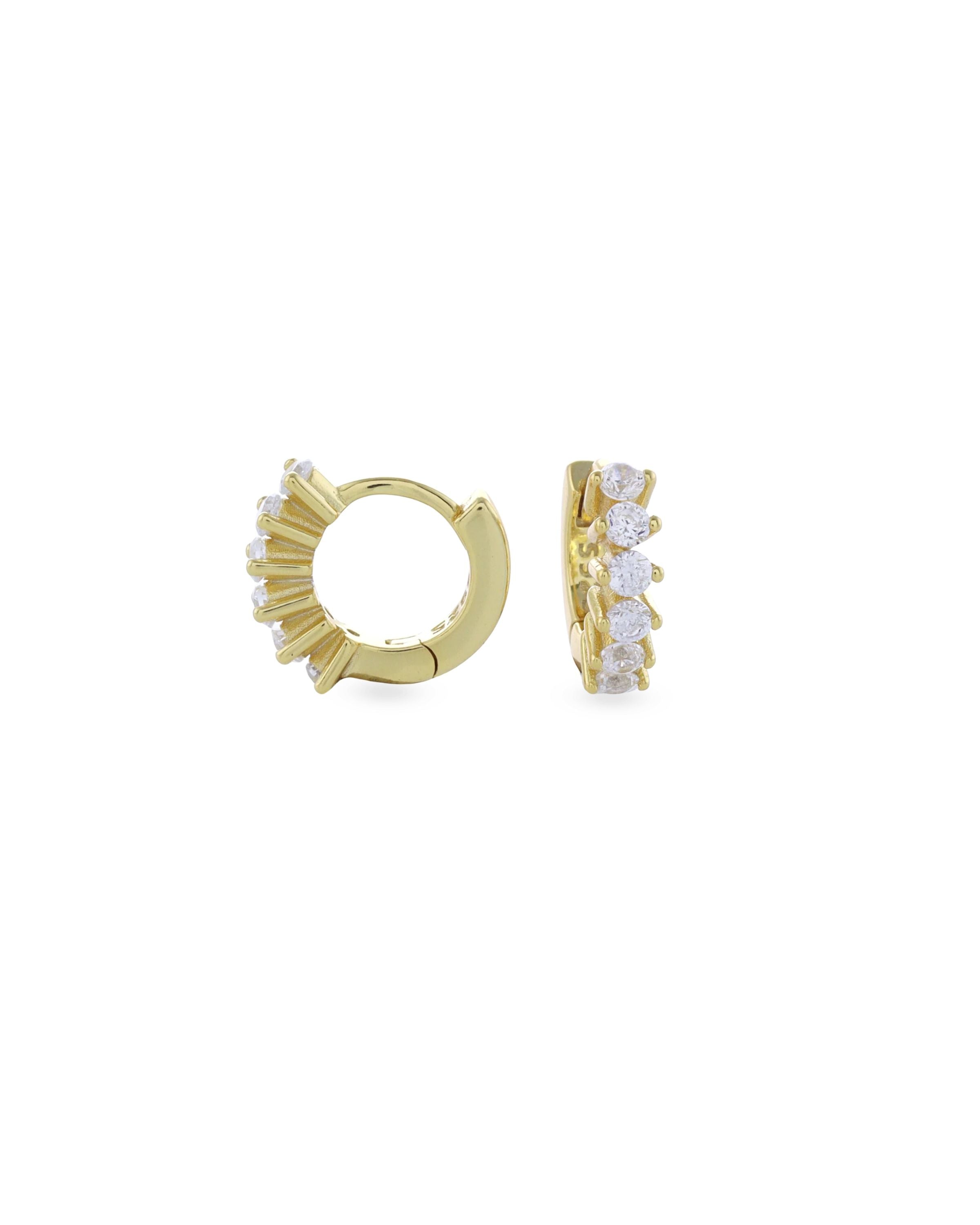 The Tiny Huggies Hoop, a pair of small gold hoop earrings that feature a row of sparkling cubic zirconia stones set in a  pointed, triangular pattern. ||| GOLD/6mm