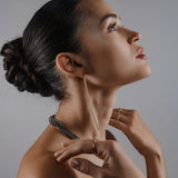 The Tennis Earring Chain, a single long gold chain earring with tiny sparkling stones.||| GOLD