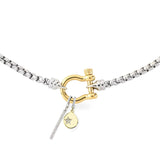 The HERRADURA SIGNATURE DOUBLE TAKE featuring a silver chain with a gold horseshoe clasp and dangling charms, including a pavé bar and a gold star pendant.|||Gold