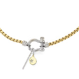 The HERRADURA SIGNATURE DOUBLE TAKE featuring a gold chain with a silver horseshoe clasp and dangling charms, including a pavé bar and a gold star pendant. ||| SILVER
