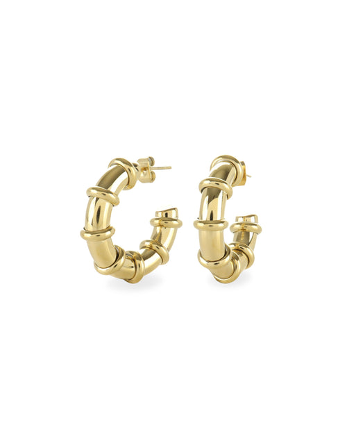 The Ringed-Up Bagel Hoops, a stunning pair of gold hoop earrings featuring a distinctive segmented design inspired by the shape of a bagel. 