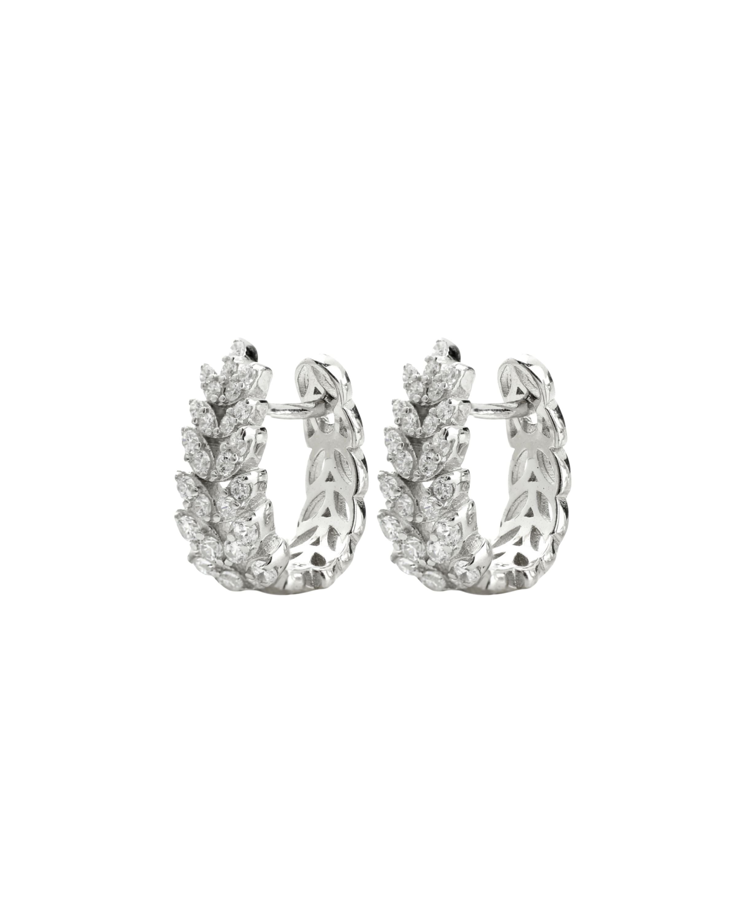 The LEAF CRYSTAL HUGGIES are made of 925 sterling silver covered with leaf shaped cubic zirconia.
