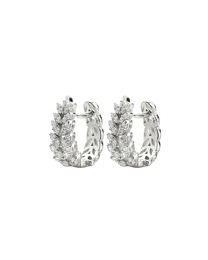 The LEAF CRYSTAL HUGGIES are made of 925 sterling silver covered with leaf shaped cubic zirconia.