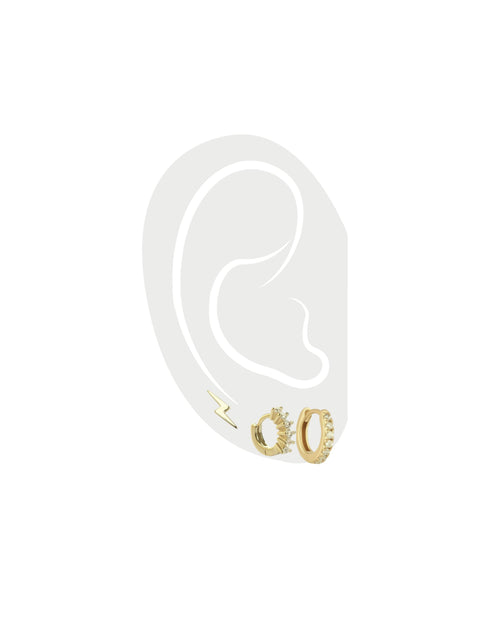 The ELBA EAR SET - 3 & 2 HOLES which comes with five earrings. a pair of tiny huggies earrings, pair of MINI CLEAR GOLD HUGGIES that are 18k gold plated with cubic zirconia and one tiny lightning earring in gold as well.