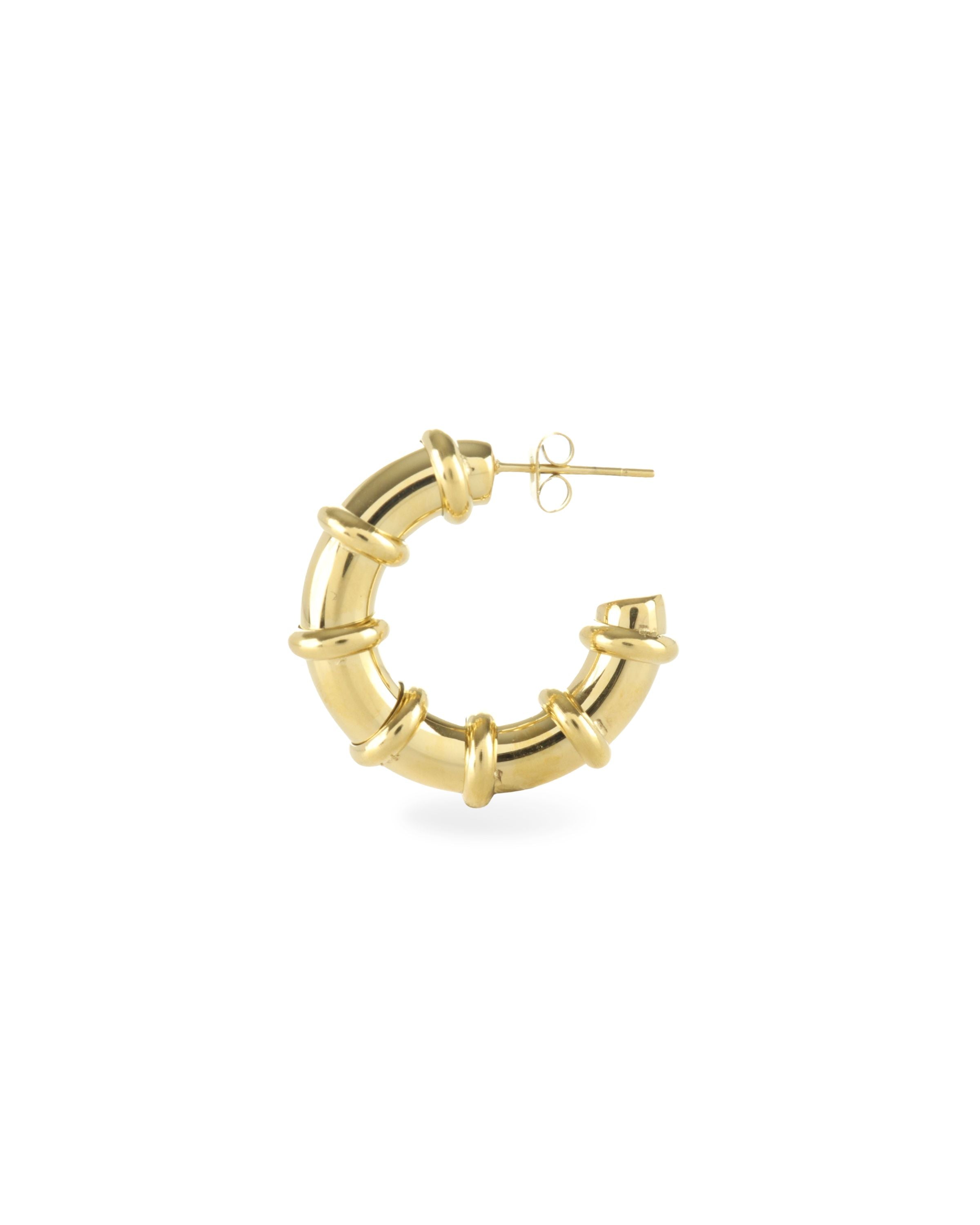 The Ringed-Up Bagel Hoops, a stunning pair of gold hoop earrings featuring a distinctive segmented design inspired by the shape of a bagel. 