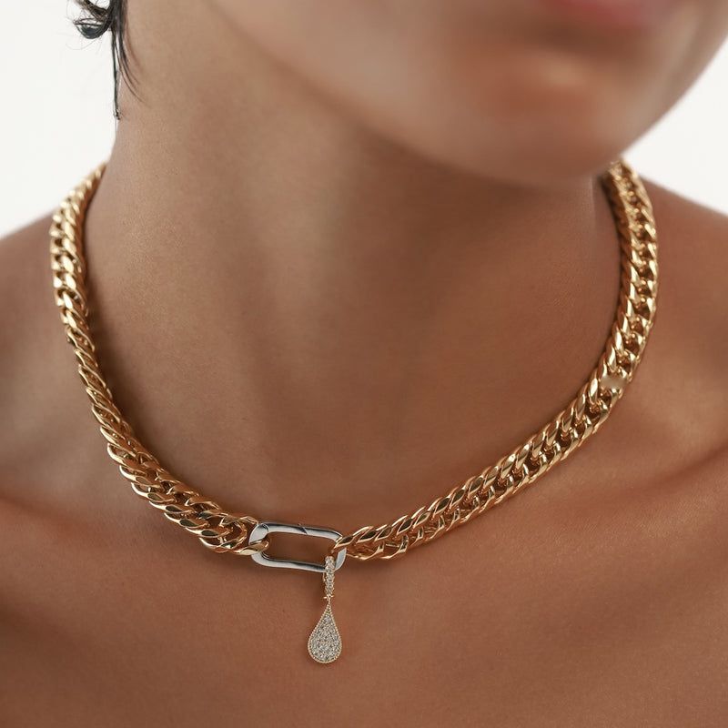 Model wearing the Just Click Gold Necklace with silver box clasp and the JUST CLICK DROP CHARM made of Sterling silver 18k gold plated encrusted zirconia drop pave charm.