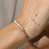 Model wearing a Sparkling Diamond Tennis Bracelet with Adjustable Slider Closure