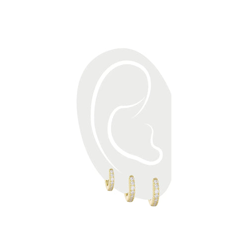 The Mini Clear Huggies Set, a set of three gold-tone huggie earrings with clear stones, perfect for stacking or solo wear.||| GOLD