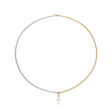 The CHARMED OPPOSITES NECKLACE, a two-tone necklace with half gold and half silver chain, featuring a small cross charm hanging from the center. |||  Cross Charm/MIX