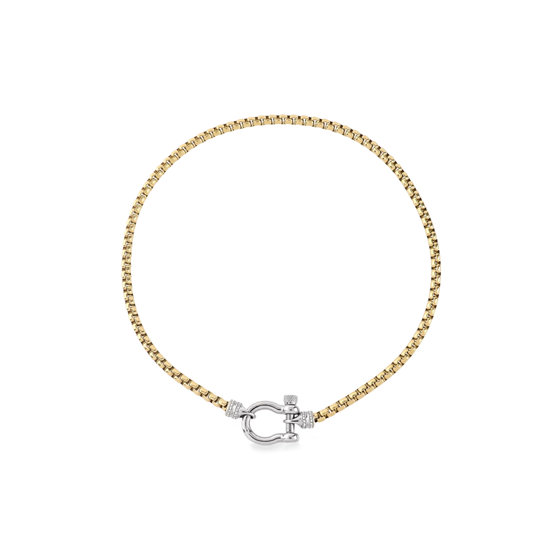 The Herradura Signature Pave Mix, a gold necklace featuring a box chain with a silver horseshoe clasp accented with pave-set diamond-like stones.