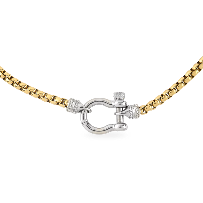 The Herradura Signature Pave Mix, a gold necklace featuring a box chain with a silver horseshoe clasp accented with pave-set diamond-like stones.