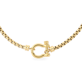 The Herradura Signature, a gold necklace featuring a box chain with a gold horseshoe clasp. ||| GOLD
