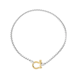 The Herradura Signature Mix, a silver necklace featuring a box chain with a gold horseshoe clasp. ||| GOLD