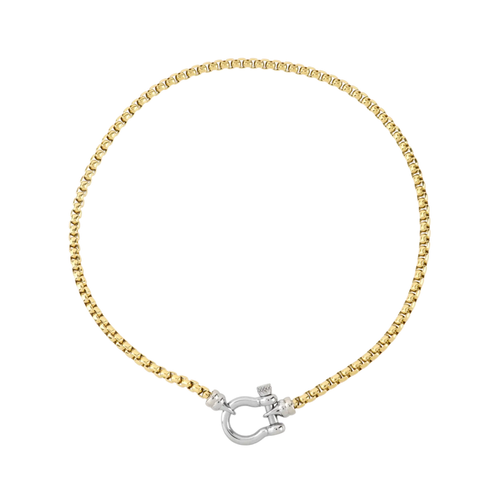 The Herradura Signature Mix, a gold necklace featuring a box chain with a silver horseshoe clasp. ||| SILVER