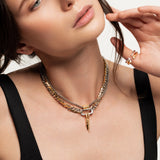 Model wearing the Just Click Nut Layered Necklace Set featuring four gold and silver chains with a mixed metal clasp and nut-inspired charm.