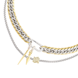 Layered necklace set featuring three mixed metal pieces, including a bold gold and silver chain with a carabiner clasp and spike charms.