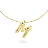 The BALLOON LETTER NECKLACE, a delicate gold necklace featuring a playful, balloon-shaped letter "M" pendant.||| M/GOLD