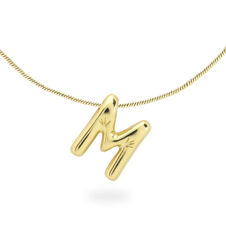 The BALLOON LETTER NECKLACE, a delicate gold necklace featuring a playful, balloon-shaped letter "M" pendant.||| M/GOLD