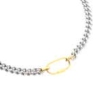 The Sleek Carabiner Anne Mix Necklace, which is a single-piece mixed metal necklace featuring a thick silver chain and a contrasting gold carabiner clasp for a clean, elevated look.