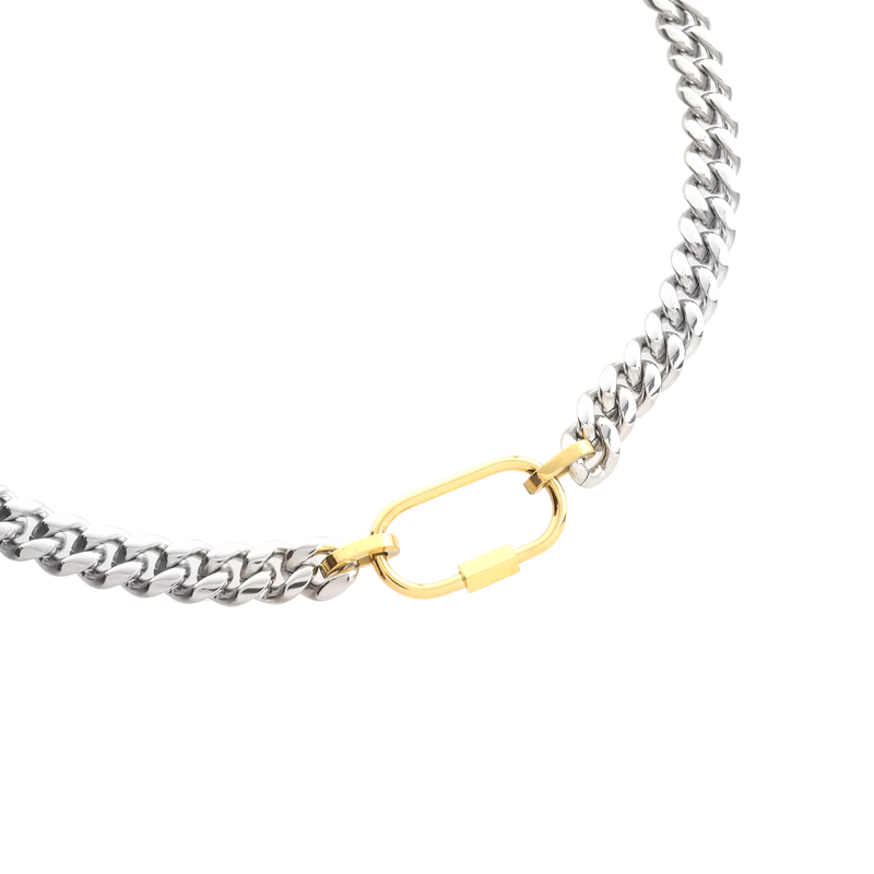 The Sleek Carabiner Anne Mix Necklace, which is a single-piece mixed metal necklace featuring a thick silver chain and a contrasting gold carabiner clasp for a clean, elevated look.