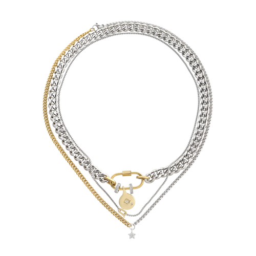 The Sleek Carabiner Cosmic Layered Necklace Set, which is a 3-piece mixed metal necklace set featuring layered silver and gold chains, a gold carabiner clasp, and celestial-themed charms including a star pendant and round charm with pavé accents.