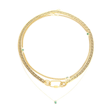The Sleek Carabiner Emerald Layered Necklace Set, which is a 4-piece gold layered necklace set featuring chunky and delicate chains, a bold carabiner link, and emerald-green stone accents for a modern, elevated stack.