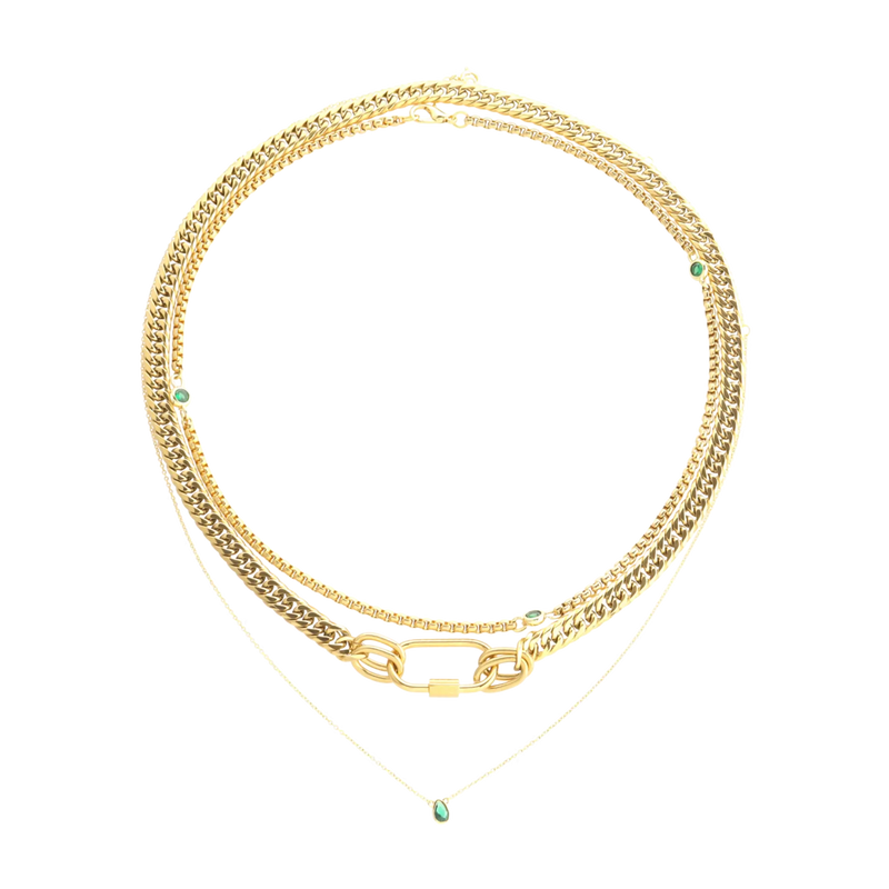 The Sleek Carabiner Emerald Layered Necklace Set, which is a 4-piece gold layered necklace set featuring chunky and delicate chains, a bold carabiner link, and emerald-green stone accents for a modern, elevated stack.