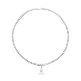 The Solitaire Tennis Necklace, which is a single silver tennis necklace featuring a round-cut solitaire pendant at the center.