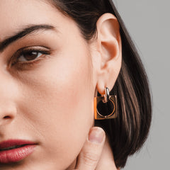 Gold and silver **Square Mix Hoops Earrings**, featuring a modern geometric design with a bold square and circular charm combination.